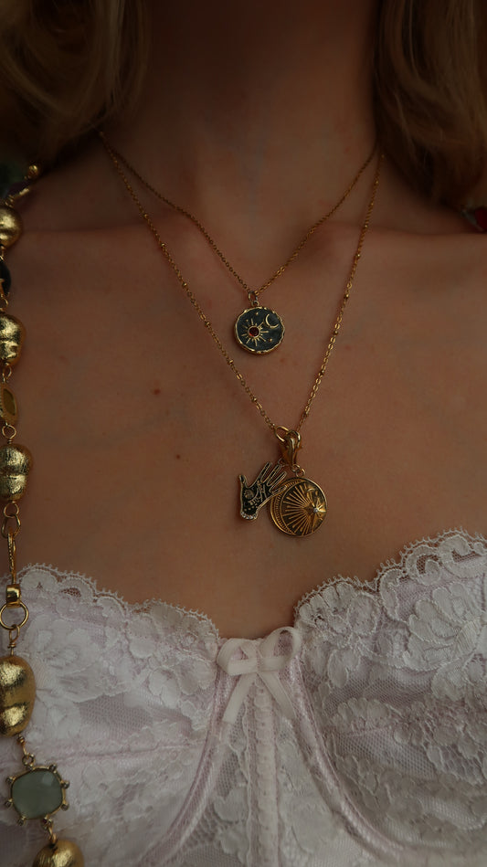 Adelia’s horoscope charm necklace