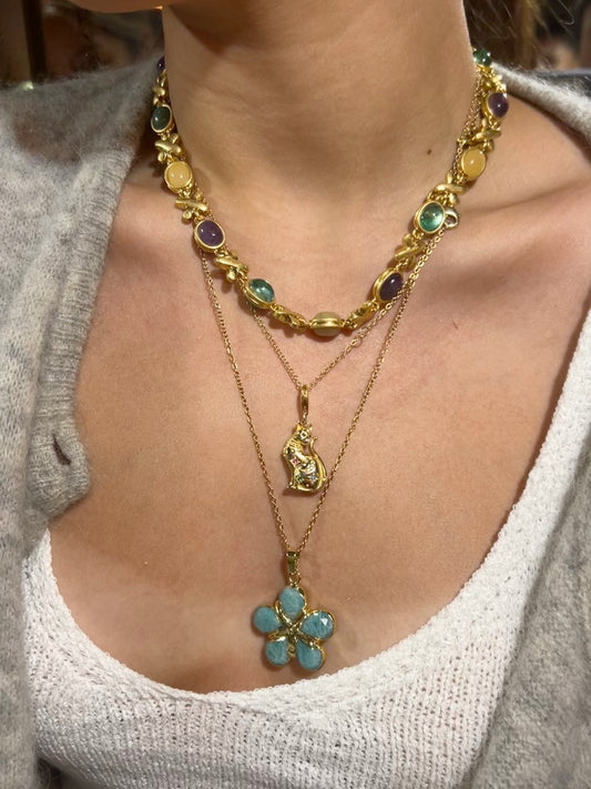 Elizabeth’s superpower cat necklace