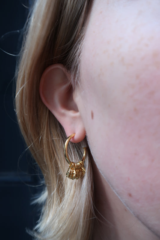 Marina’s feather hoops