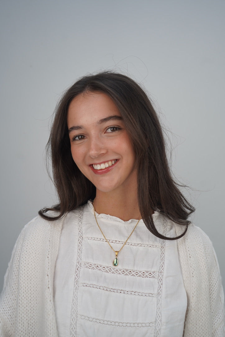 Thalia’s gemstone pendant