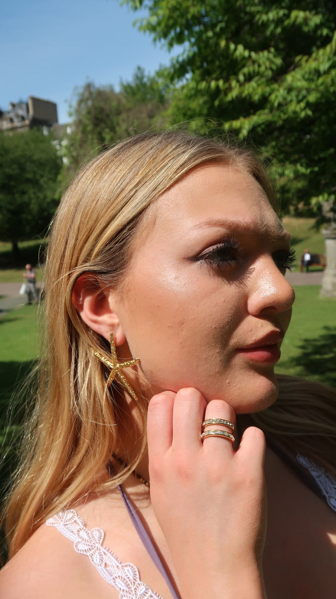 Daphne’s white gemstone ring