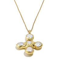 Daisy's gold cross necklace is