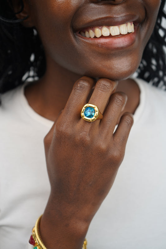 Olivia's blue ring