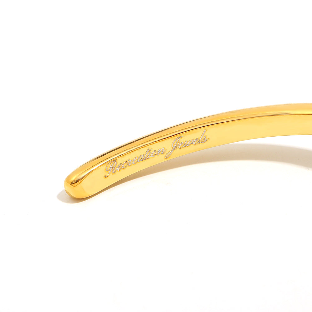 Naia's Spiral Bangle in Gold