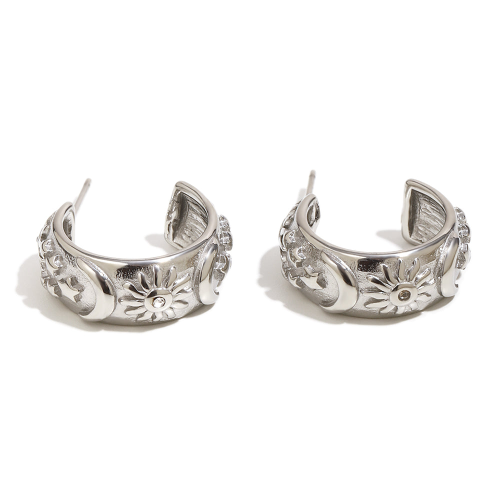 Maria's celestial earrings in silver