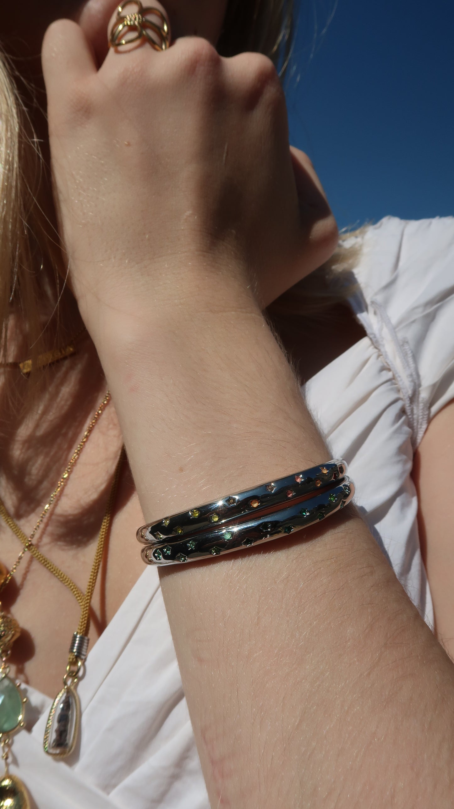Eloise's Sunset Star Bangle In Silver