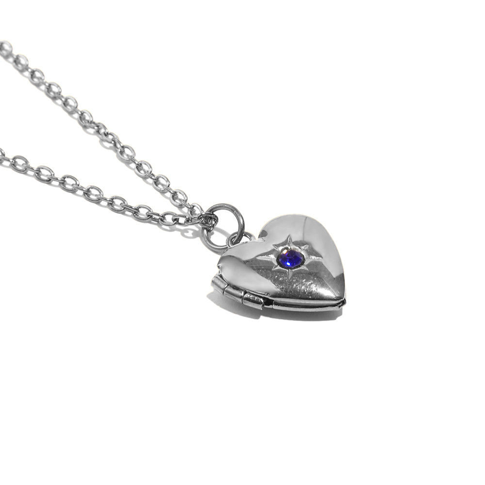 Tiana's Sapphire Blue Heart Locket In Silver