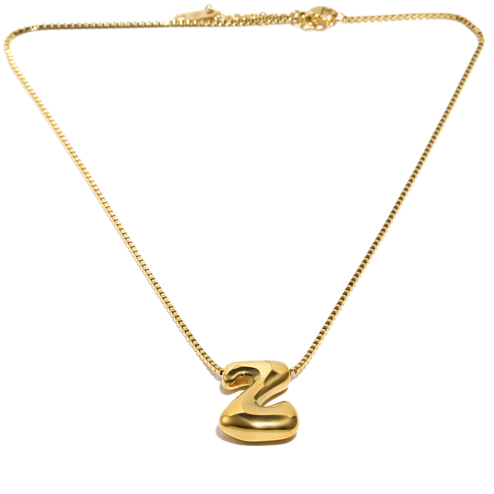 The Bubble Letter Pendant In Gold