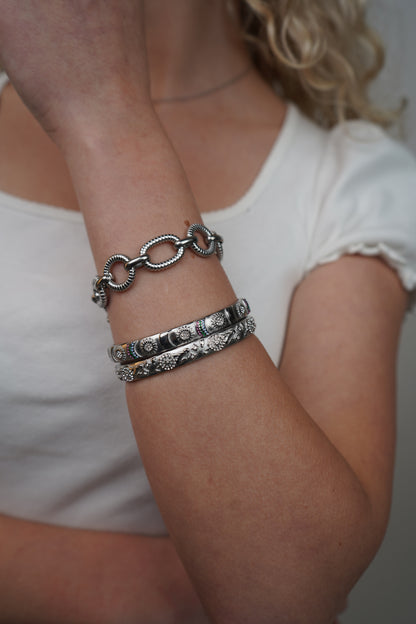 Thea’s silver bracelet