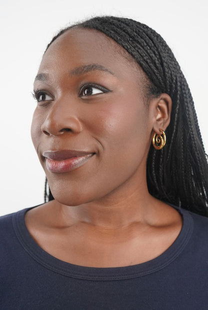 Tilly’s gold swirl earrings