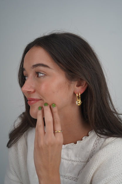 Maia’s Midnight sky huggies in gold