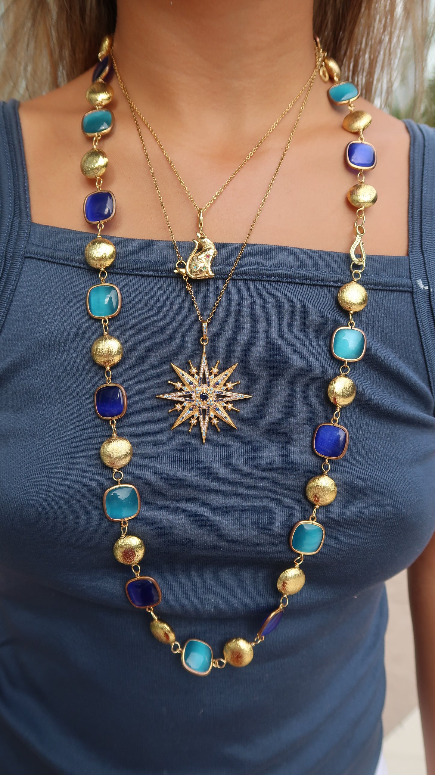 Emilie’s star necklace in gold