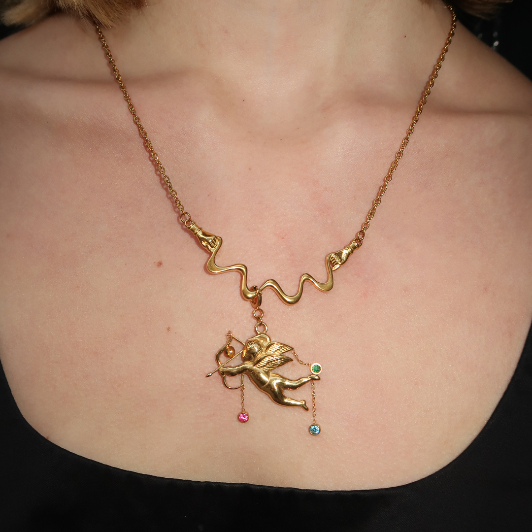 the Cupid Charm in gold