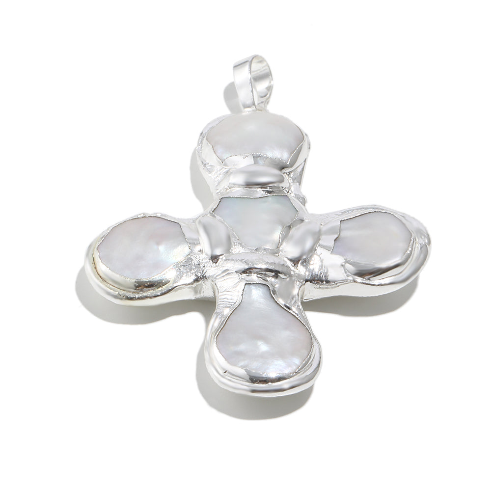 Daisy's silver cross necklace