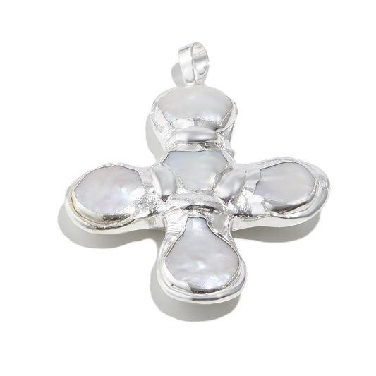 Daisy's silver cross necklace