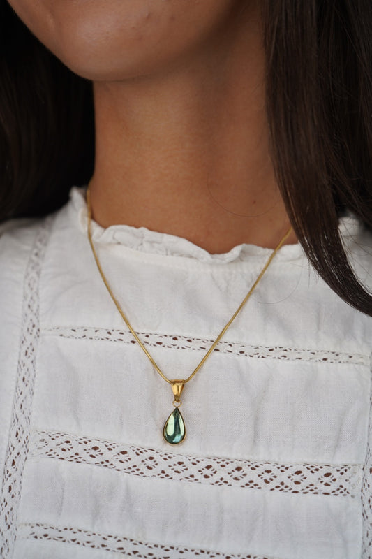 Thalia’s gemstone pendant