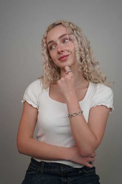 Thea’s silver bracelet