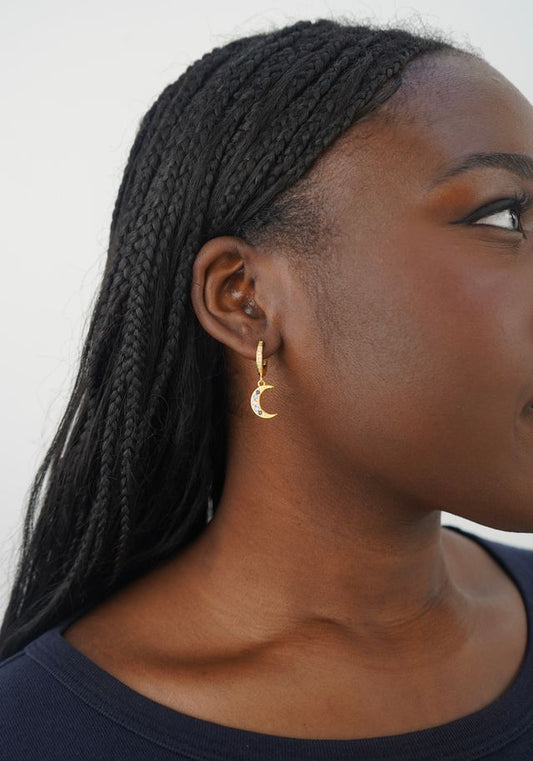 Maia’s Midnight sky huggies in gold