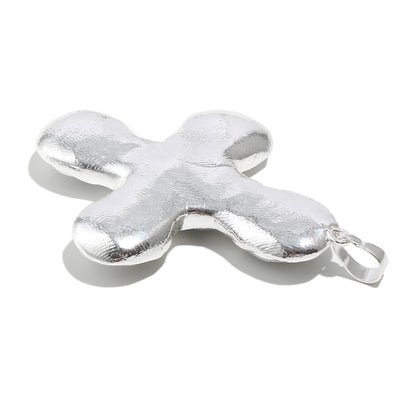 Daisy's silver cross necklace