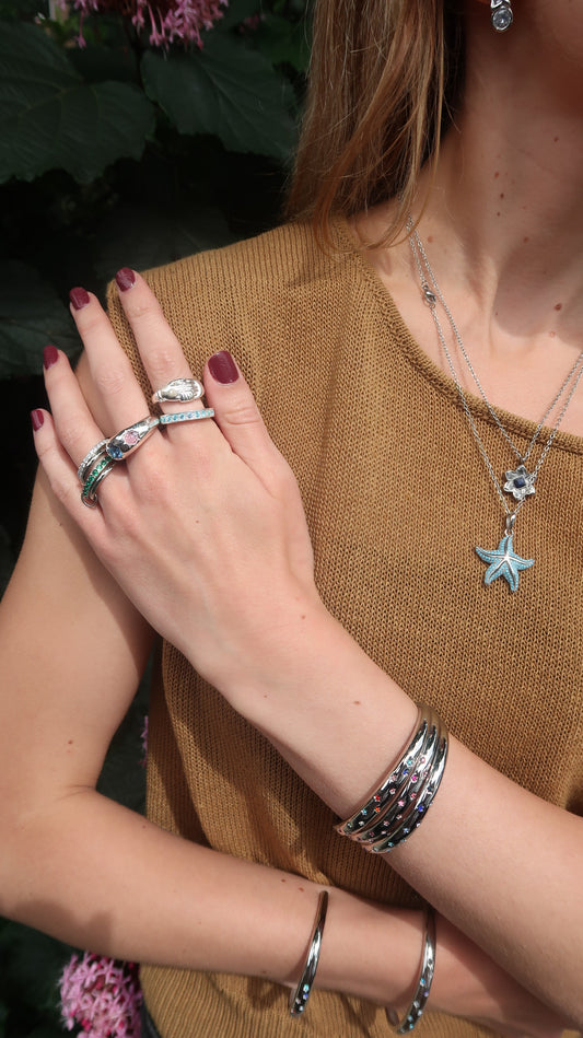 Eloise's Pink Star Bangle In Silver