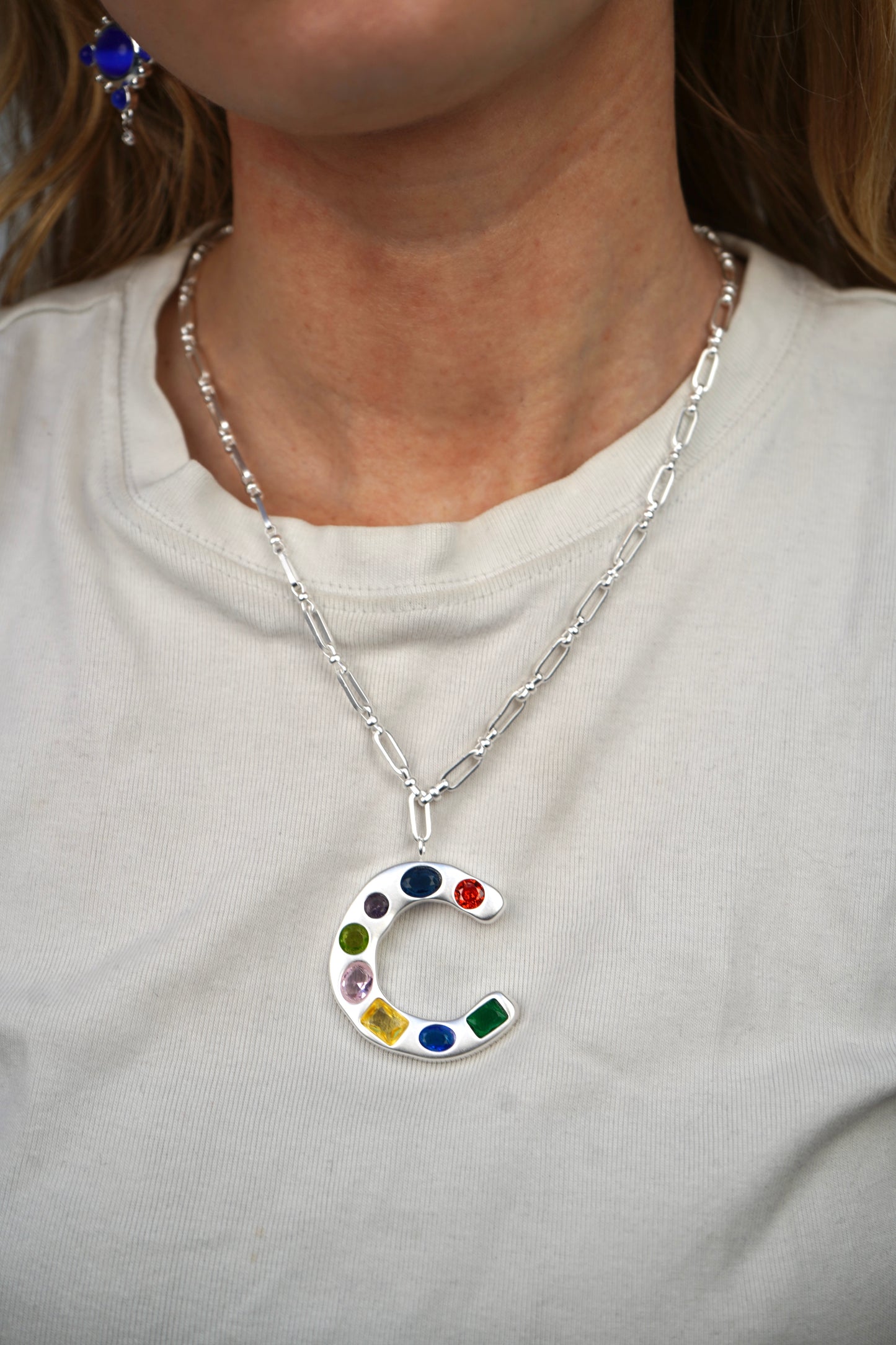 The Gemstone Alphabet Pendant In Silver