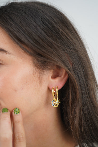 Maia’s Midnight sky huggies in gold