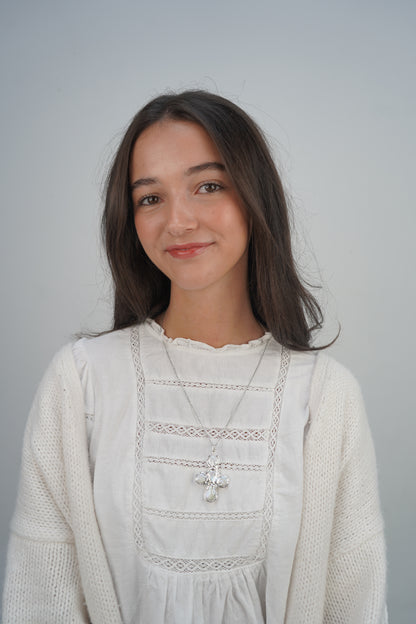 Daisy's silver cross necklaces