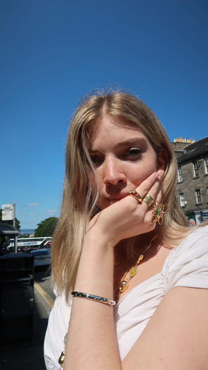 Eloise's Sunset Star Bangle In Silver
