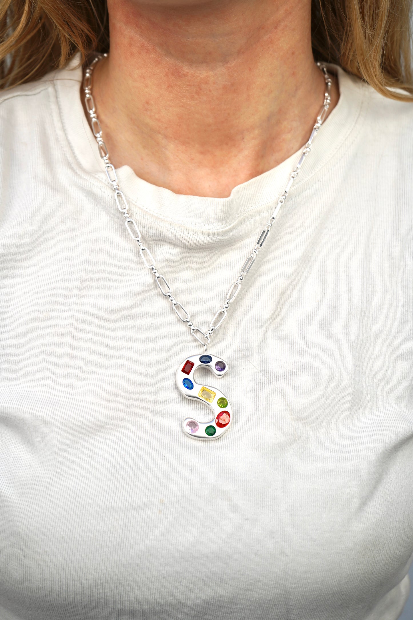 The Gemstone Alphabet Pendant In Silver