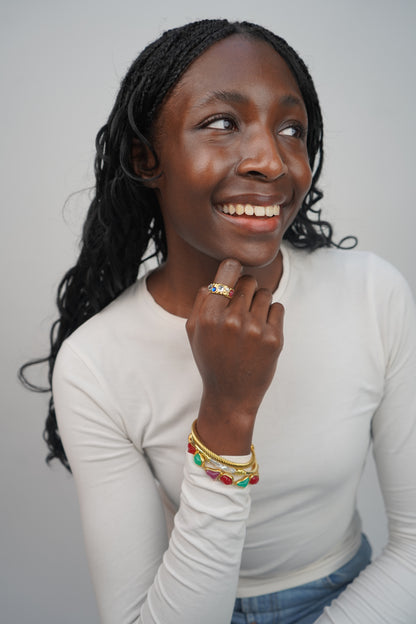 Mokkie’s gemstone ring in gold