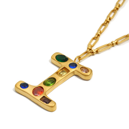 The Gemstone Alphabet Pendant In Gold