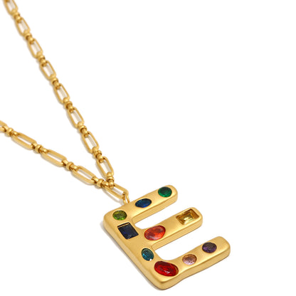 The Gemstone Alphabet Pendant In Gold