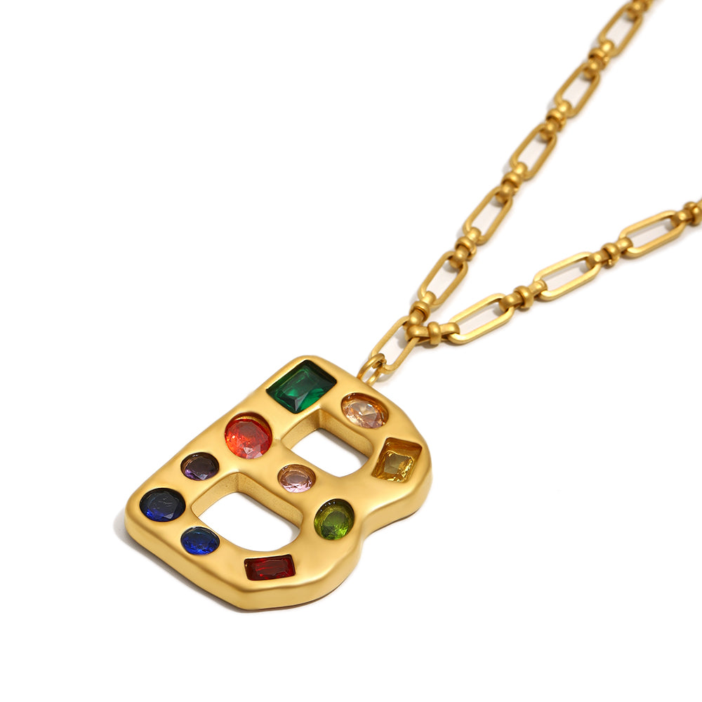 The Gemstone Alphabet Pendant In Gold