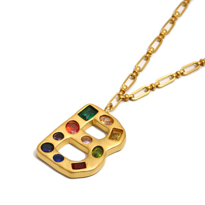 The Gemstone Alphabet Pendant In Gold