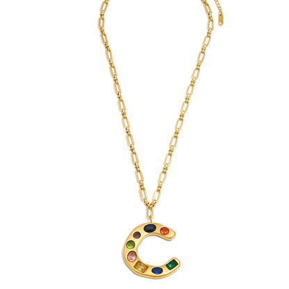 The Gemstone Alphabet Pendant In Gold