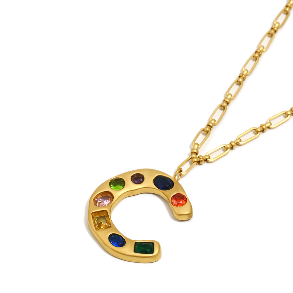 The Gemstone Alphabet Pendant In Gold