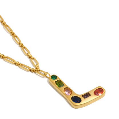 The Gemstone Alphabet Pendant In Gold