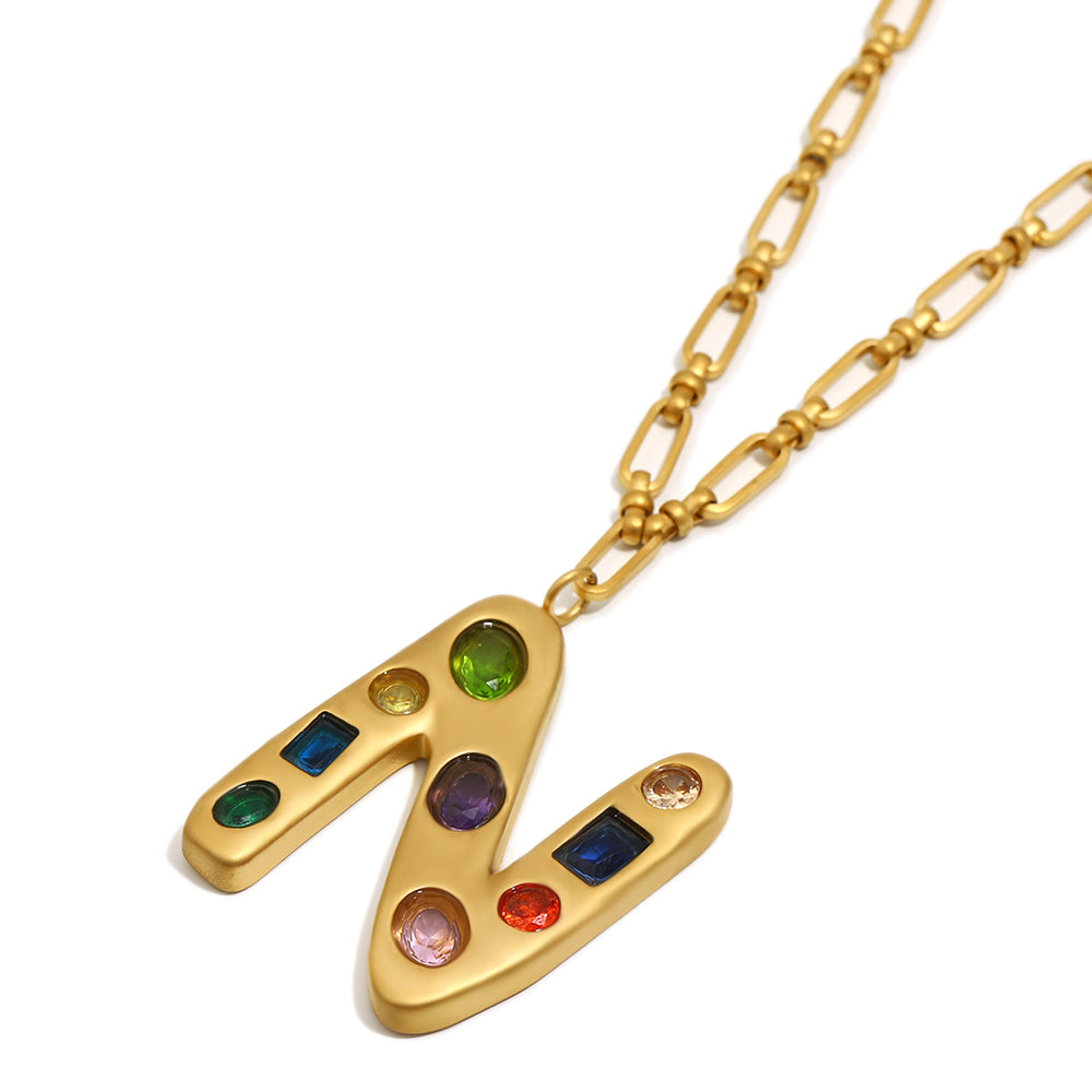 The Gemstone Alphabet Pendant In Gold