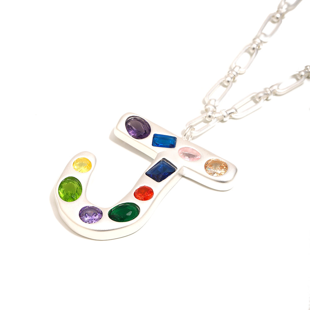 The Gemstone Alphabet Pendant In Silver