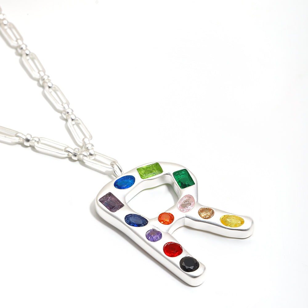 The Gemstone Alphabet Pendant In Silver