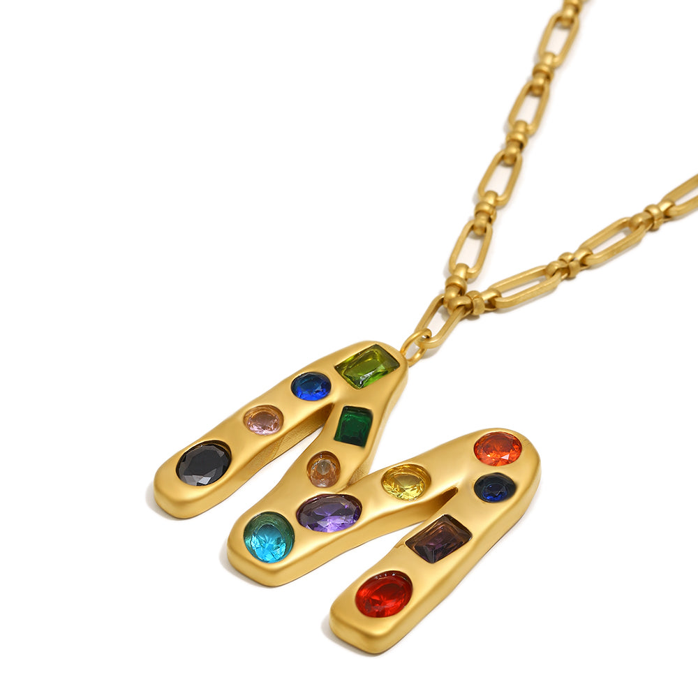 The Gemstone Alphabet Pendant In Gold