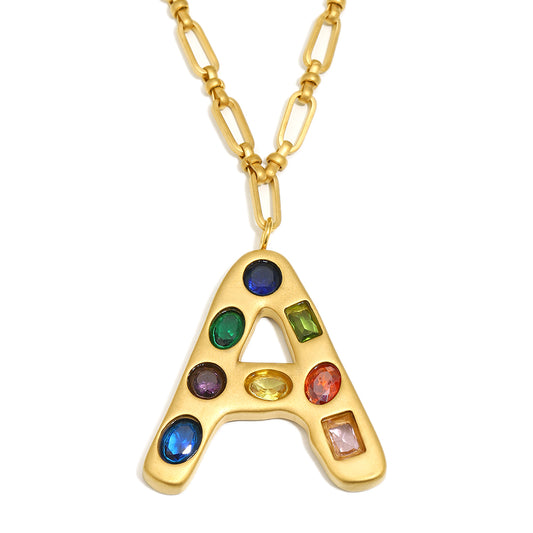 The Gemstone Alphabet Pendant In Gold