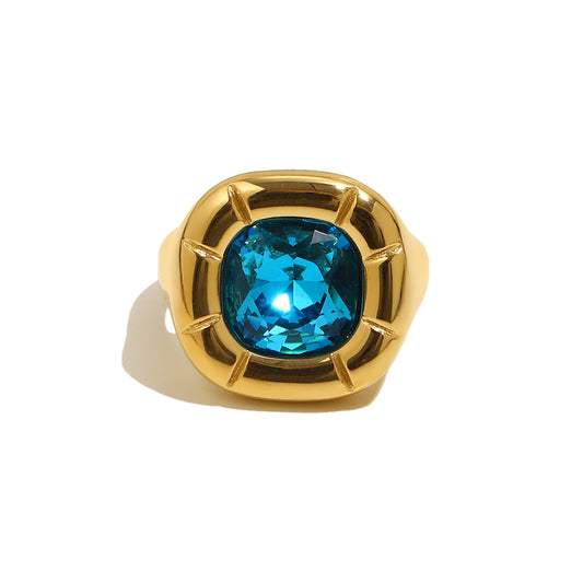 Olivia's blue ring