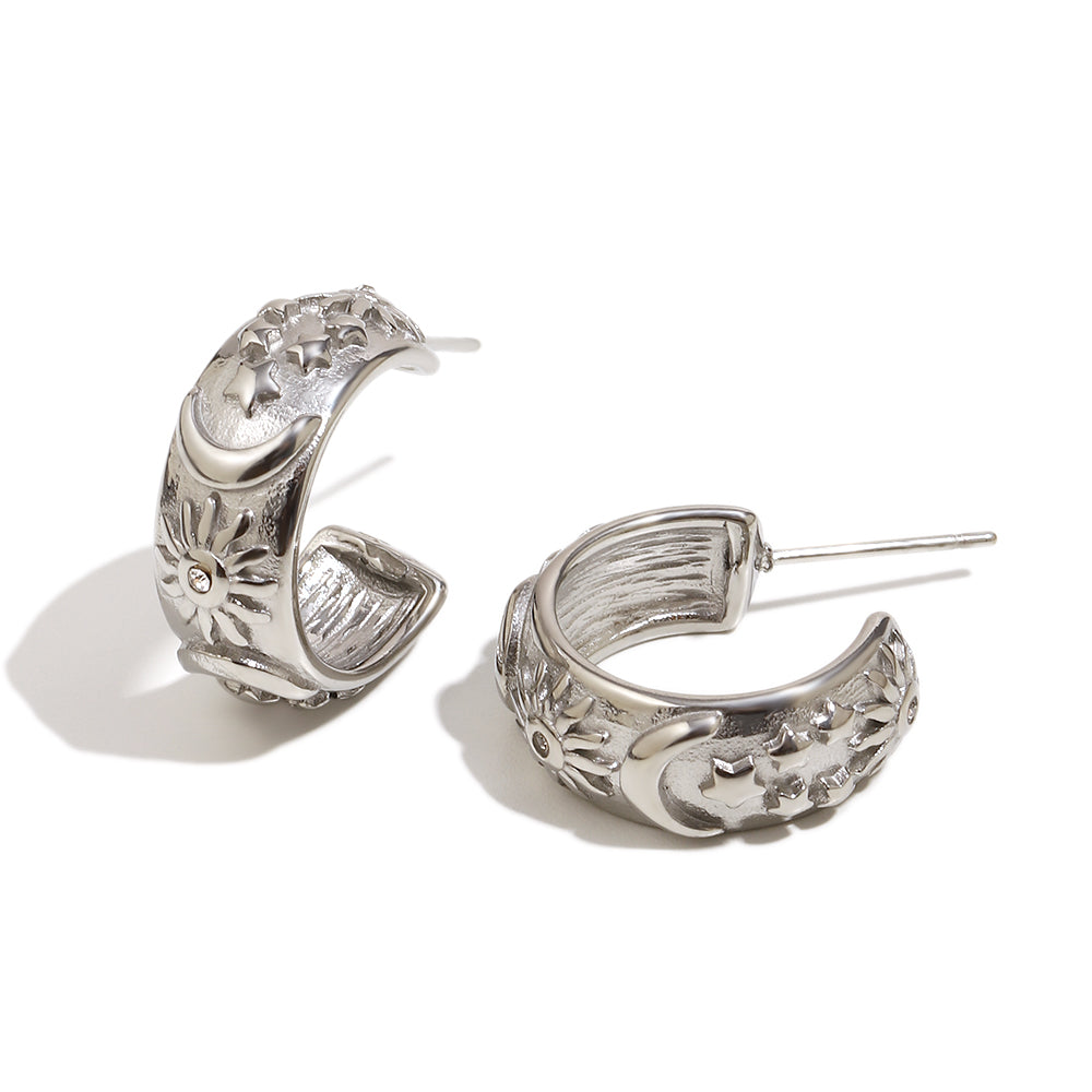 Maria's celestial earrings in silver