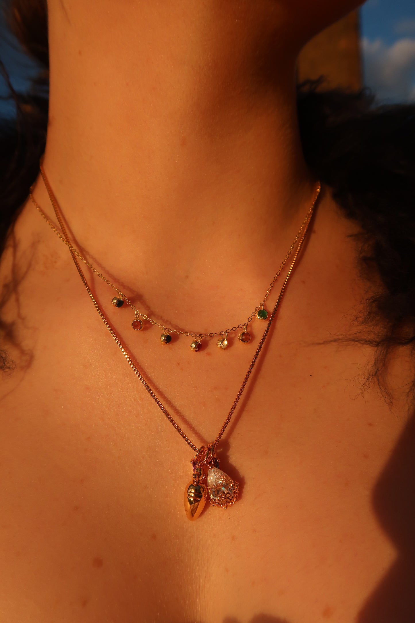 Ellen’s gemstone necklace in gold