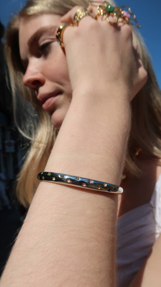 Eloise's Sunset Star Bangle In Silver