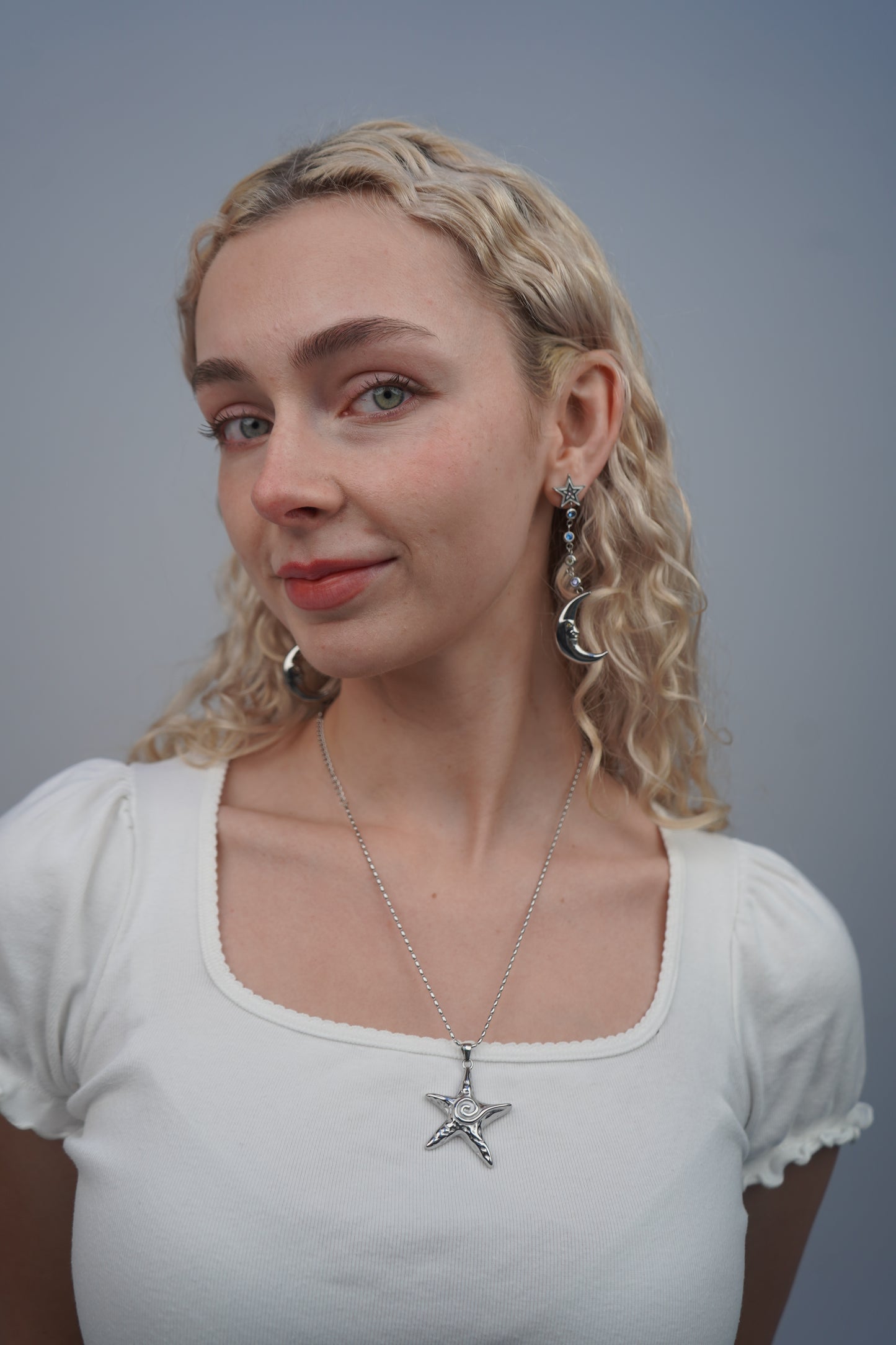 Eleanora's Star And Moon Drop Earrings In Silver