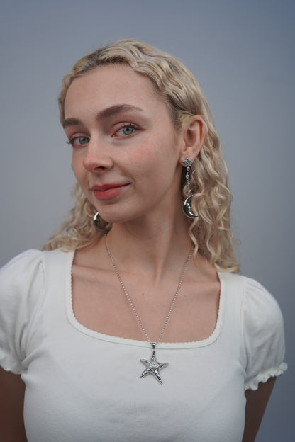 Eleanora's Star And Moon Drop Earrings In Silver