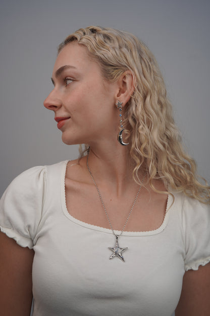 Eleanora's Star And Moon Drop Earrings In Silver
