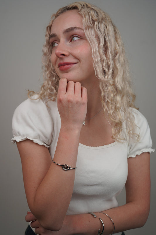 Naia's Spiral Bangle in Silver